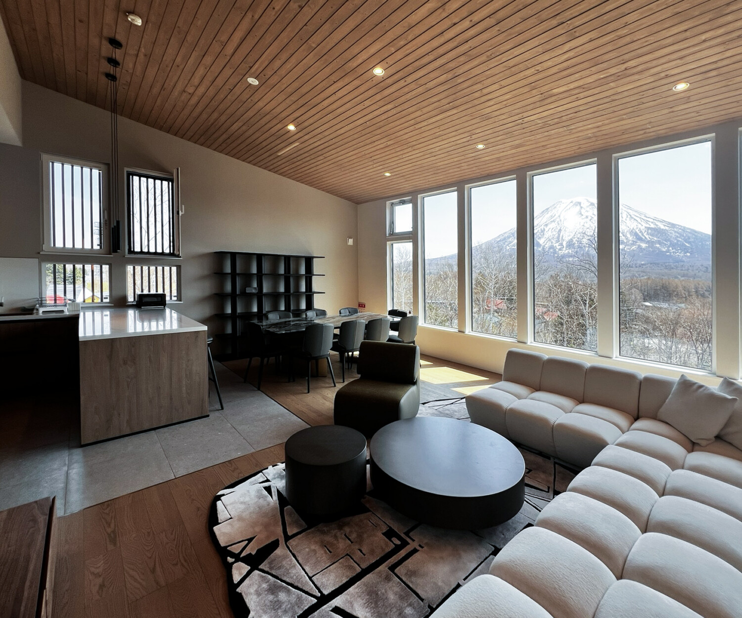 Yugen House Living Room with a view of Mt. Yotei through the windows