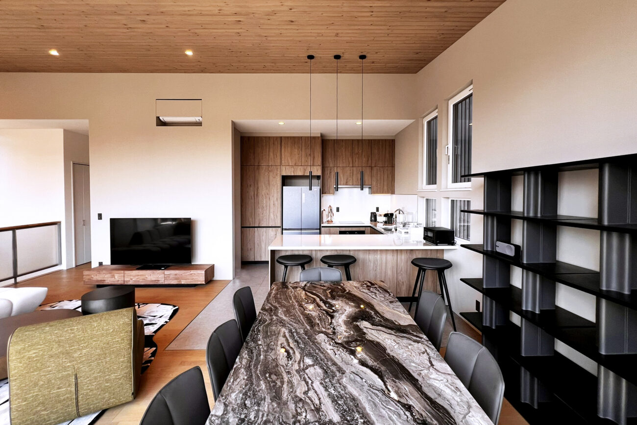 Yugen House Living Room with a view of Mt. Yotei through the windows