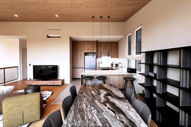 Yugen House Living Room with a view of Mt. Yotei through the windows